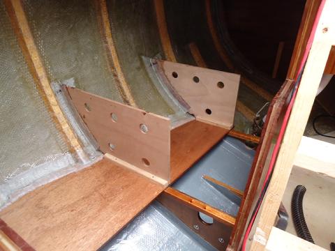 The dividers are tapped in and secured to 1"x1" ash cleats. I will install the wood plugs later.
