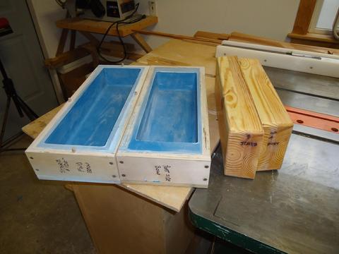 The core box after the core master has been pulled from the mold. The line of separation between the two halves is call the parting line. The flat surface of th